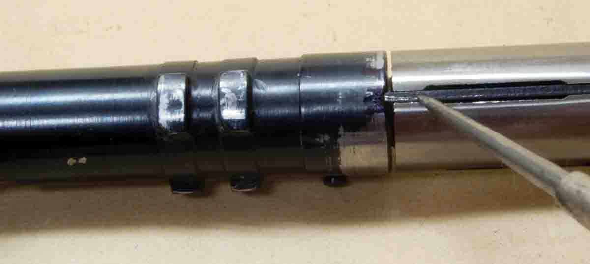 The firing pin should move freely. Pushing with a scribe point will tell if it doesn’t, disassemble and clean the slot.